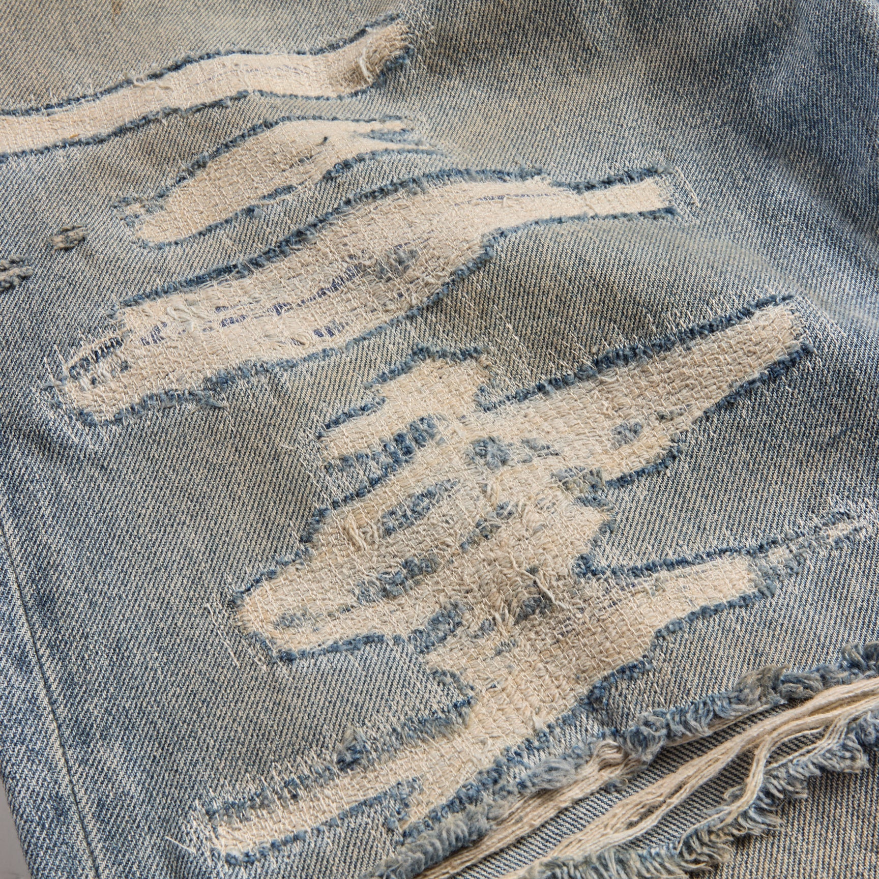 TEAR DENIM